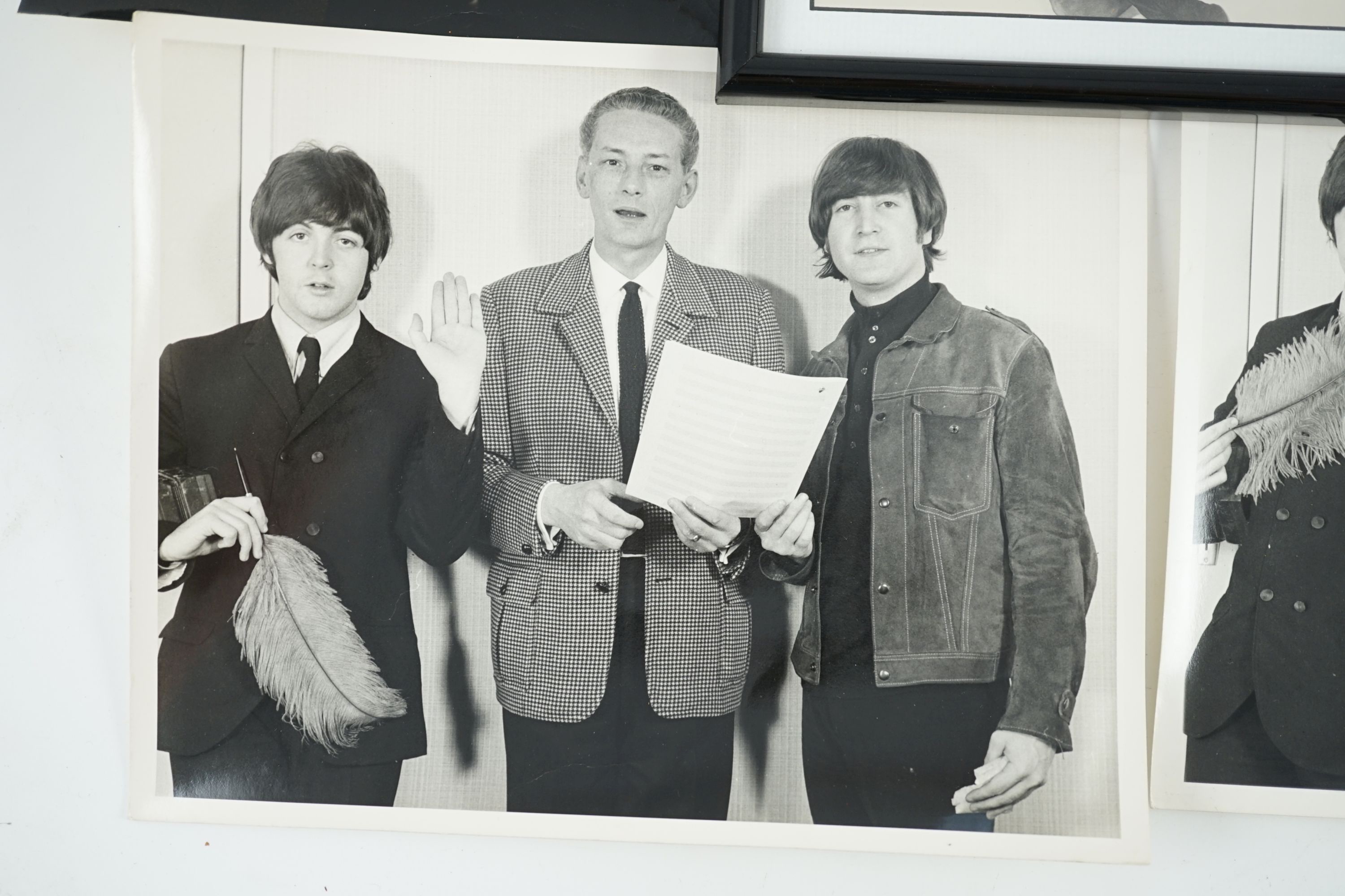 An autographed Beatles photograph and four related photographs of the Beatles with Peter Aldersley Autographed photo 19.5 x 14.5cm.